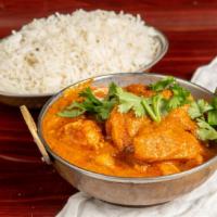 Chicken Vindaloo · Tender boneless chicken cooked in spicy potatoes cooked spicy, sharp, and tangy vindaloo cur...