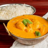 Shrimp Makhani · Shrimp cooked in cumin scented butter with tomatoes, ginger, garlic, cashews and mild spices.