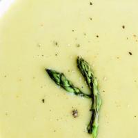 Creamy Asparagus Soup · Creamy Asparagus Soup served with crunchy onions
