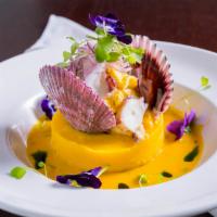 Ceviche Panka · Infused with black squid ink and rocoto cream.