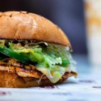 Spicy Baja Chicken Burger · Grilled chicken breast, jalapeños, guacamole, pepper jack cheese, lettuce, and chipotle mayo...