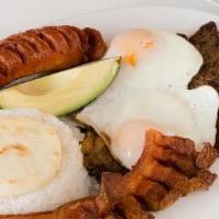 Bandeja Paisa · Grilled beef, beans, rice, avocado, fried sweet plantains, eggs, and pork cracklings.
