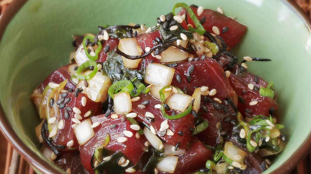 Tataki · Seared tuna, cherry tomato, red pepper, scallion, radish sprouts, red onion, mango and pokebab sauce.