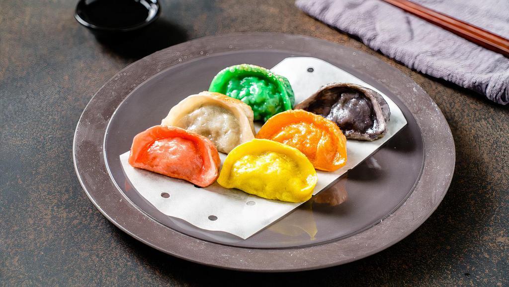 The Rainbow (6Pcs In Different Flavor) 彩虹 · Pork with cabbage dumpling/pork with chive dumpling/chicken with mushroom dumpling/beef with carrot dumpling/black truffle pork dumplings/vegetable dumpling----------one of each.