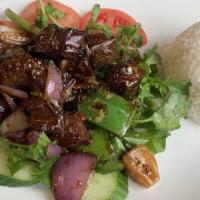 Bbq Short Ribs · Served with white rice and salad. Fried rice for an additional charge / cơm sườn bò nướng.