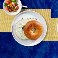 Vegetable Cream Cheese Bagel · Toasted bagel with vegetable cream cheese.