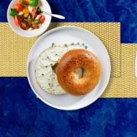 Scallion Cream Cheese Bagel · Toasted bagel with scallion cream cheese.