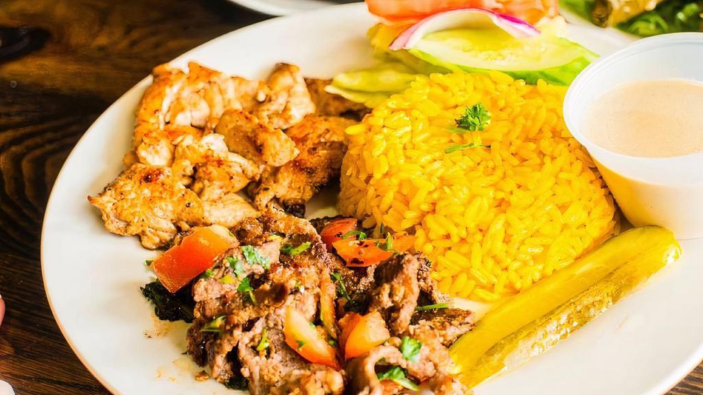 Mix Beef & Chicken Shawarma · The original taste of middle eastern shawarma. fresh diced tomato and parsley topped with homemade tahini sauce or white sauce.