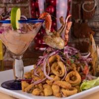 Classico · A traditional combination of fish ceviche and batter-coated fried calamari, mussels, shrimps...