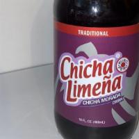 Chicha Morada (Botella) · Glass bottled chicha morada.