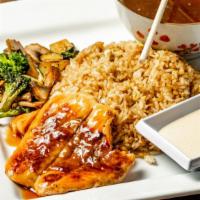 Hibachi Salmon · Served with hibachi fried rice, vegetable, clear soup, and yum yum sauce.