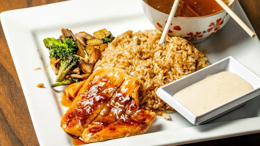 Hibachi Salmon · Served with hibachi fried rice, vegetable, clear soup, and yum yum sauce.