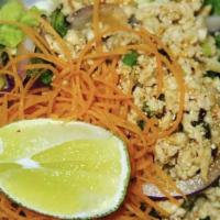 Larb Salad · Ground chicken , scallion, Thai herbs, toasted rice powder, lime, red onion and mint. Hot an...