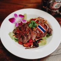 Grill Skirt Steak Salad · Grilled skirt steak marinated with Thai homemade spicy sauce.