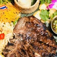 Grilled T-Bone Steak With 5 Spiced Sauce (20 Oz) · served with fired potatoes, papaya salad ( contains peanut ) and sticky rice