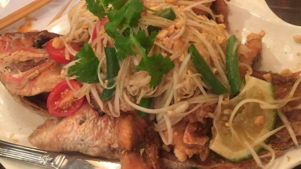 Whole Fish Red Snapper With Papaya Salad Sauce · Fried whole fish topped with green papaya, tomato, peanut and long bean in spicy lime dressing.