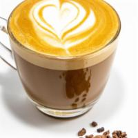 Cortado · Two shots of Corsica blend espresso with just a dash of hemp-oat milk and foam.

Espresso an...