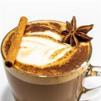 Chai Latte · Black tea, a blend of warming herbs and spices & a touch of honeyed sweetness steamed with h...