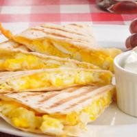 Cheese Quesadilla · Greek bread with a blend of five cheese seared outside with extra cheese.