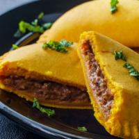 Beef Patty / Pastelito De Res · Seasoned ground beef with our special seasonings stuffed in a fried, flaky turnover.