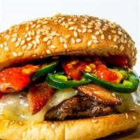 The Jalapeño · Pepper Jack cheeseburger,smoked bacon, jalapeños, house sauce, pickled spicy peppers and pic...