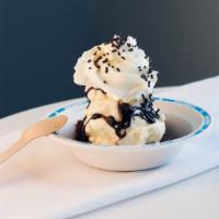 Brownie Sundae · Choose 2 scoops, hot fudge or caramel, dry topping choice, whipped cream on top of warm brow...