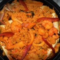 Seafood Paella · Serves two. Option to Add extra Serving for an additional charge.