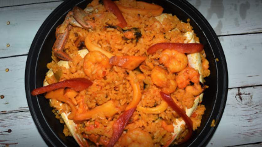 Seafood Paella · Serves two. Option to Add extra Serving for an additional charge.