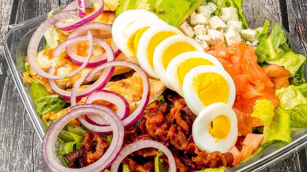 California Cobb Salad · Romaine, Grilled Chicken, Chopped Bacon, Avocado, Tomato, Onion, Blue Cheese, And Hard Boiled Egg, With Lemon Vinaigrette.