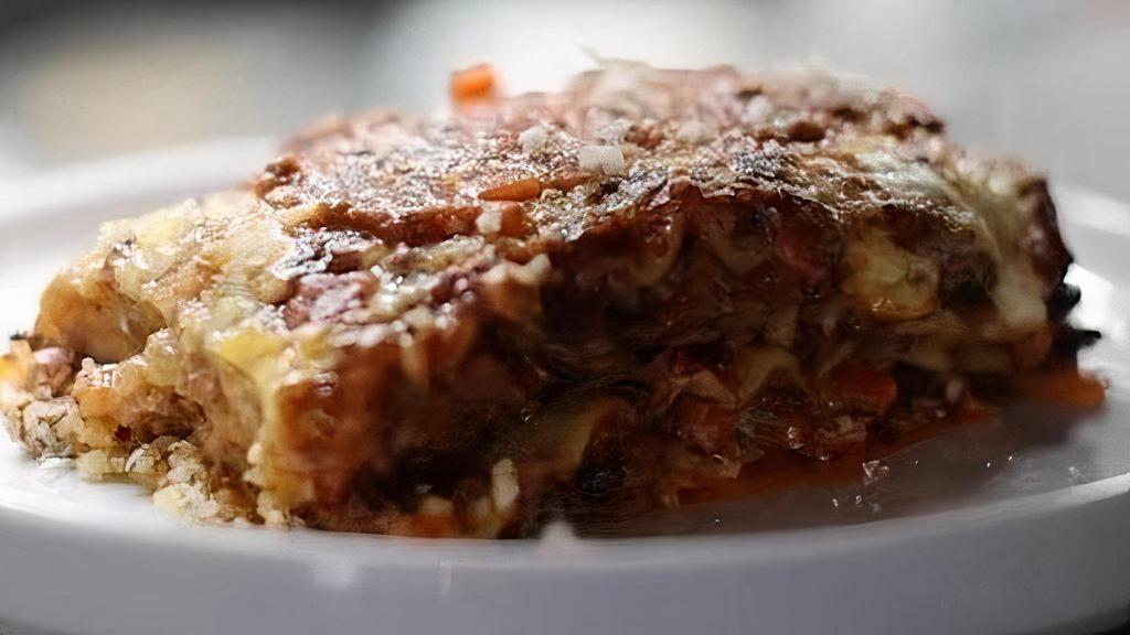 Lasagna Special · Lasagna with bolognese Ragù, bechamel sauce, mozzarella cheese and parmigiano