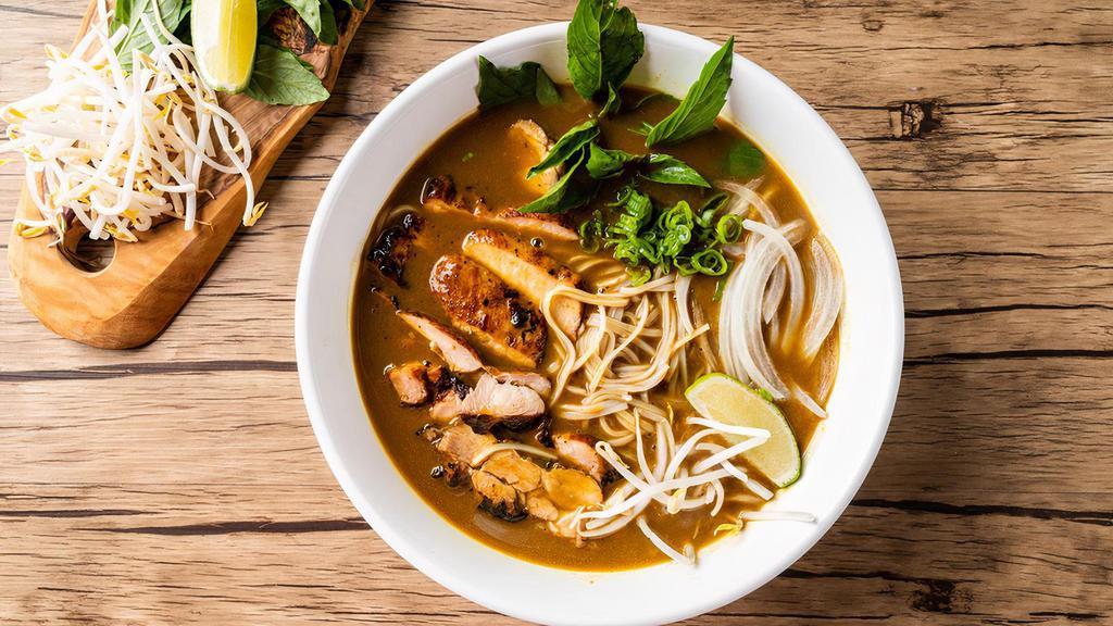 Curry Chicken Pho Noodle Soup · Grilled chicken with rice noodles, served with curry flavor broth, onions, scallions, and lemon, basil & bean sprouts on the side.