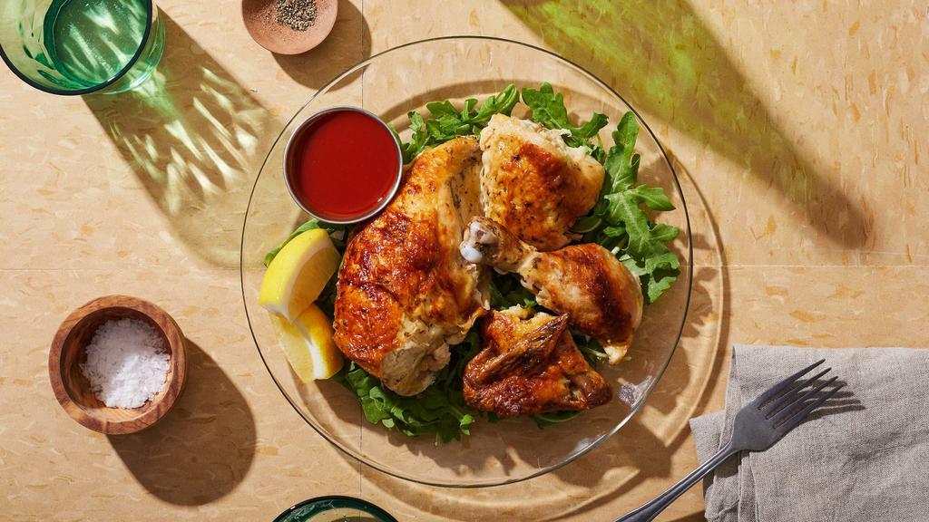 Half Chicken · Grilled chicken breast, thigh, leg, and wing, served with your choice of two sauces.