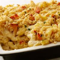 Lobster Mac N' Cheese · Our 4 cheese macaroni is baked to perfection in our homemade sauce and topped with fresh lob...