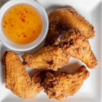Thai Wings · Fried chicken wings, sweet chili sauce.