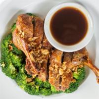 Crispy Duck · Gluten Free. twice cooked duck served with, crispy shallot, homemade tamarind
sauce, steamed...