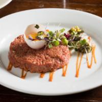 Tartare Appetizer · Raw filet mignon with toats