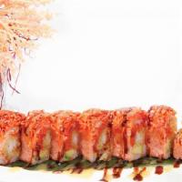 Angry Dragon Roll · Shrimp tempura, avocado, and spicy tuna inside topped with Alaska king crab and served with ...