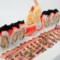 Black Angel Roll · Shrimp tempura topped with crabmeat and black caviar served with strawberry sauce.