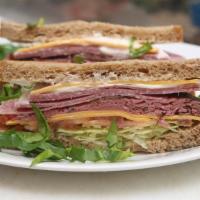 Roast Beef Sandwich · Served with lettuce, and tomato.
