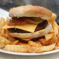 Texas Cheese Burger Deluxe · With bacon, Monterey jack cheese, and coleslaw. Served with French fries and pickles.