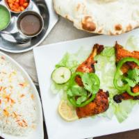 Chicken Tandoori · Spring chicken marinated in mild spices and barbecued.