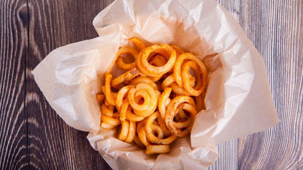 Curly Fries · Flavorful and crisped to perfection.