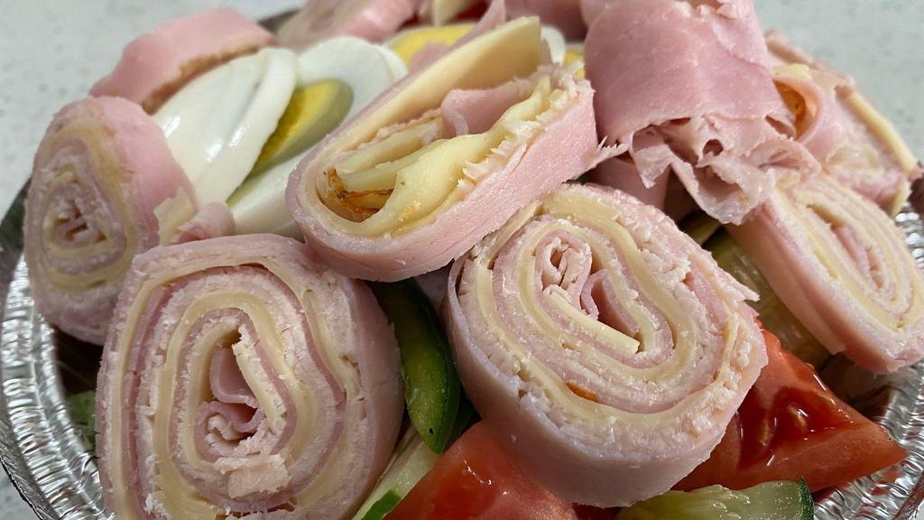 Chef'S Salad · Comes with ham, swiss, turkey, lettuce, tomatoes, onions, carrots, and hard boiled egg.