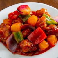 Sweet & Sour Pork 甜酸咕嚕肉 · Served with white rice.