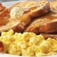 French Toast · Served with 2 eggs any style and choice of breakfast meat.