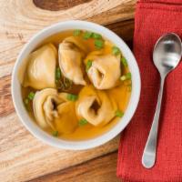 Wonton Soup · Seasoned broth with filled wonton dumplings.