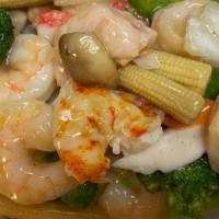 Lobster Hawaii · Lobster meat, jumbo shrimp, and imitation crab meat sautéed with fresh vegetables in white s...
