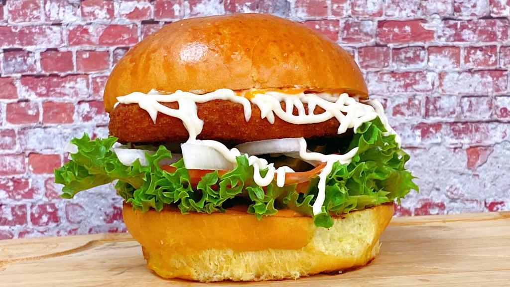 Fried Chickenless Burger · Fried Chickenless, Brioche bun, Lettuce, tomatoes, pickles, onion and chopotle sauce