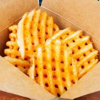 Waffle Crispy Fries · Lattice shaped fried potatoes.
