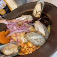 Ceviche Bravazo · Fish, Octopus, razor clams, shrimp, squid, caviar marinated, in lemon, aioli of rocoto chili...